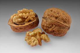 walnuts via https://en.wikipedia.org/wiki/Walnut#/media/File:Walnuts_-_whole_and_open_with_halved_kernel.jpg